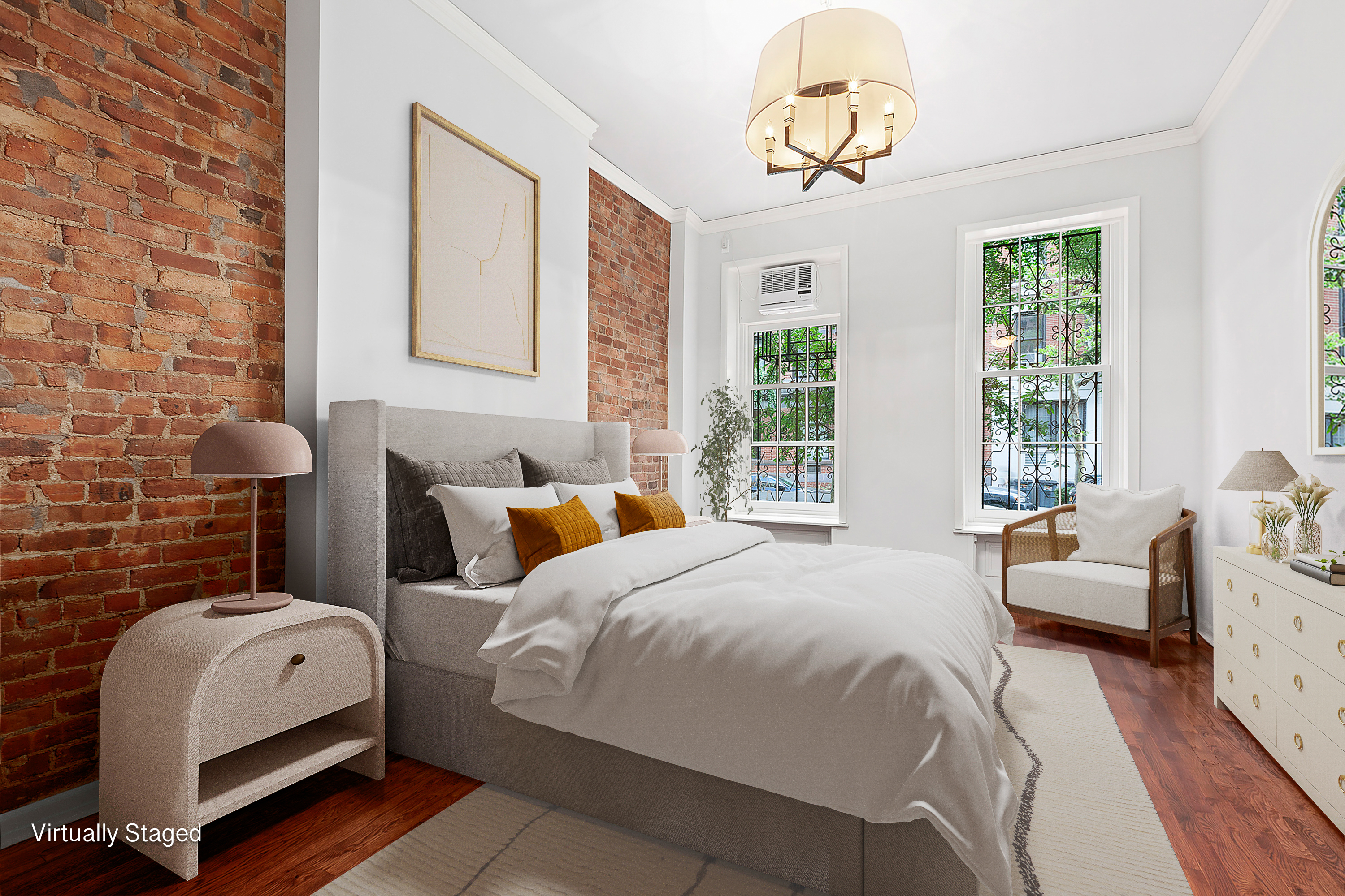 522 East 82nd Street, Unit 1 Manhattan, NY 10028 - Photo 12 of 16 a bedroom with bed couch and window