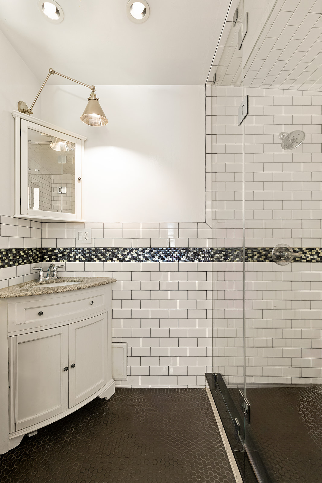 300 West 108th Street, Unit 2C Manhattan, NY 10025 - Photo 9 of 16 a view of a bathroom with a sink