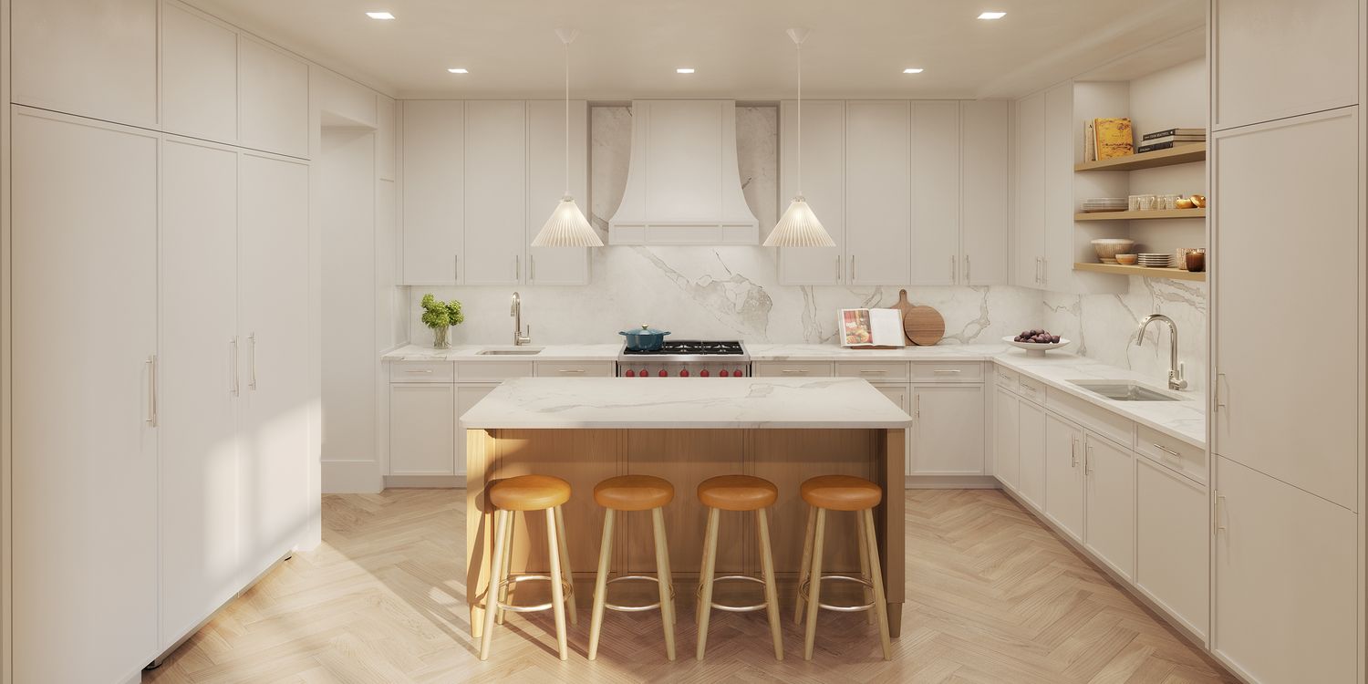 a kitchen with stainless steel appliances kitchen island granite countertop a sink and a refrigerator