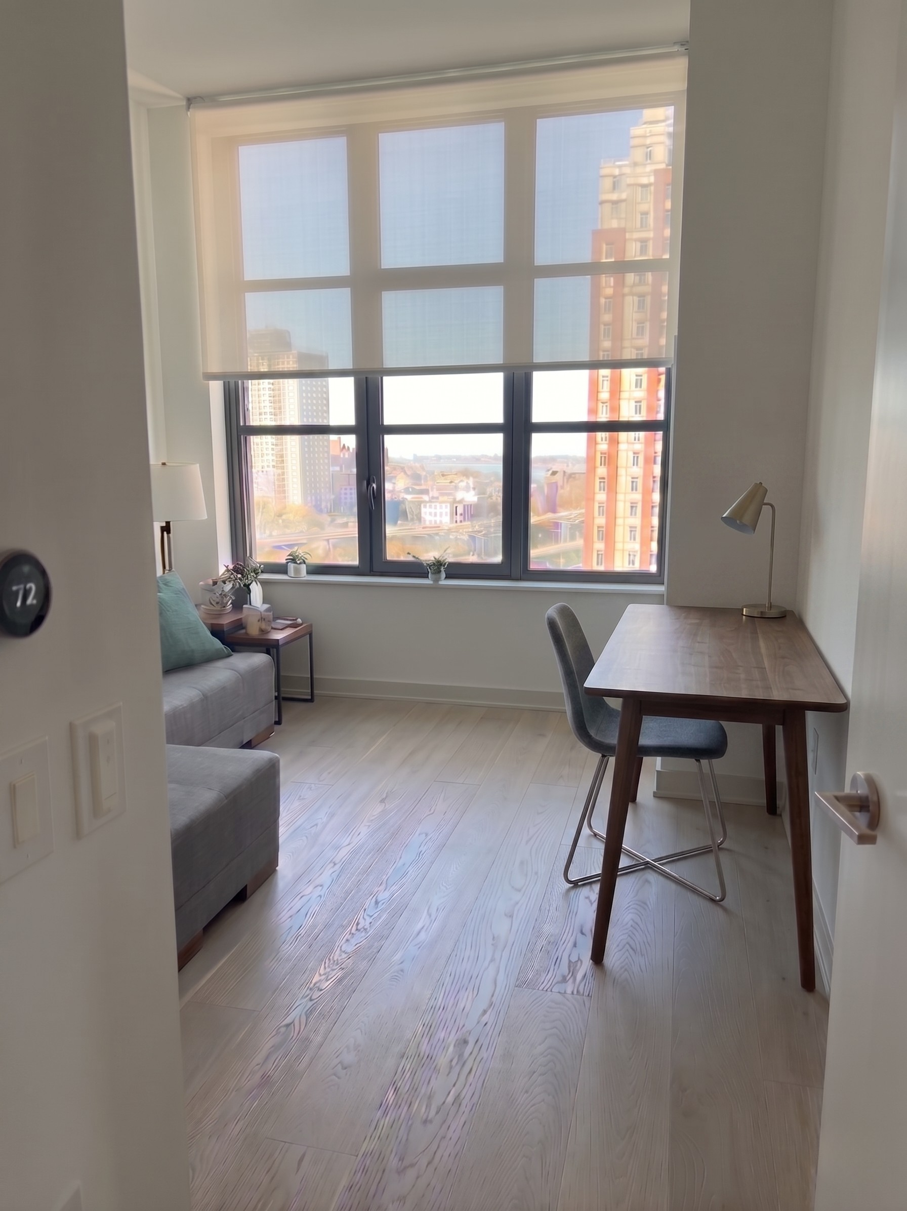 85 Jay Street, Unit 11A Brooklyn, NY 11201 - Photo 7 of 25 a living room with furniture and a window