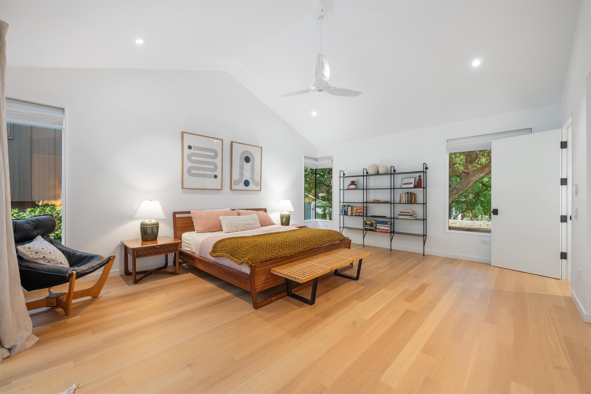 1206 Bickler Road Austin, TX 78704 - Photo 35 of 65 a spacious bedroom with a bed and furniture