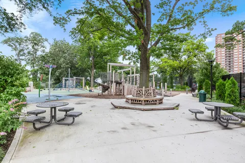 a view of a train that is sitting on the tracks