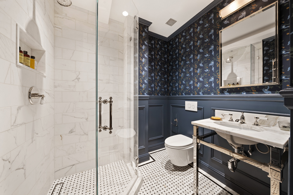 67 Perry Street, Unit 3 Manhattan, NY 10014 - Photo 17 of 22 a bathroom with a sink toilet and shower
