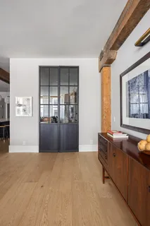 a living room with furniture and window