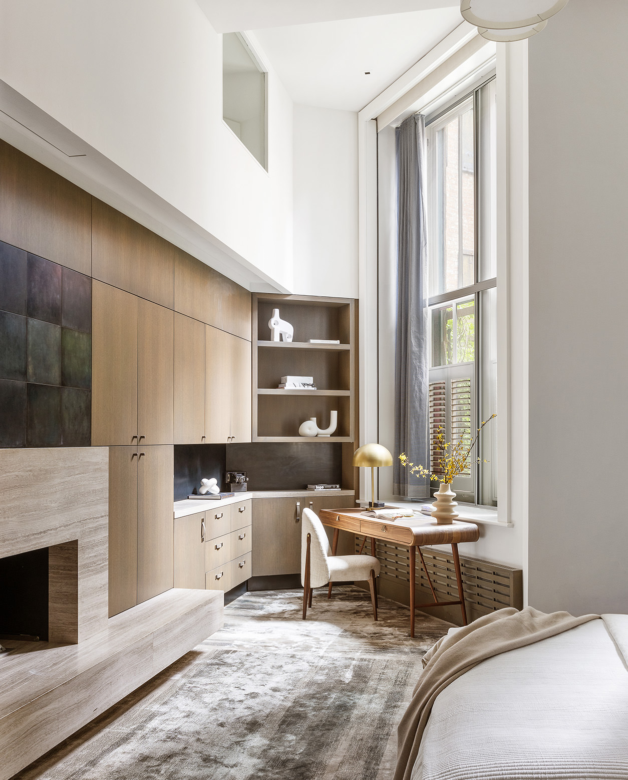 56 Crosby Street, Unit 2A Manhattan, NY 10012 - Photo 14 of 21 a living room with furniture a fireplace and a table