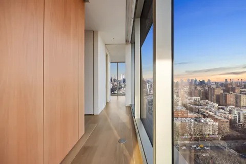 a view of a bathroom from a hallway
