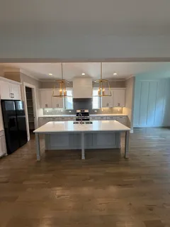 a kitchen with a sink cabinets and counter space