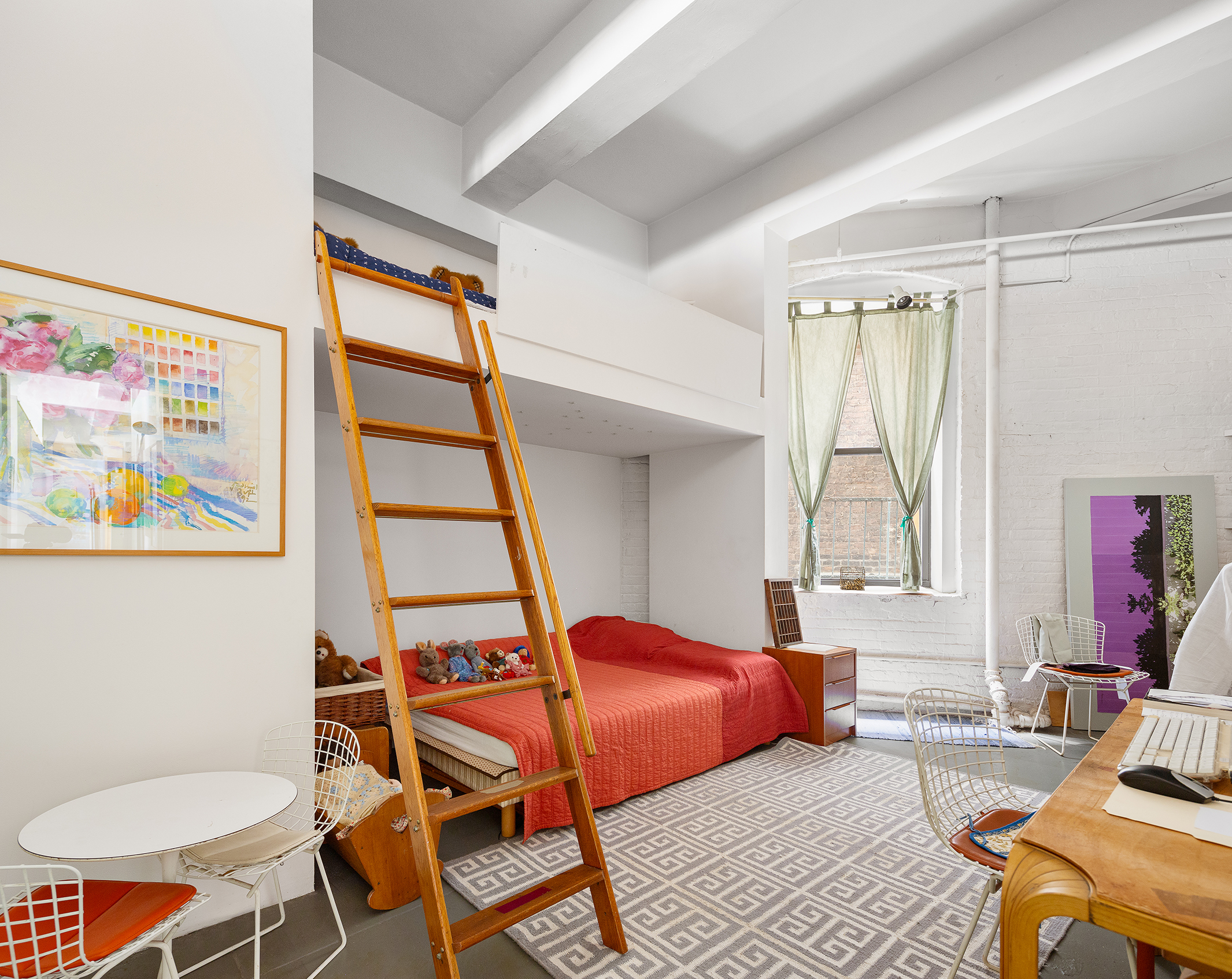 477 Washington Street Manhattan, NY 10013 - Photo 12 of 20 a bedroom with a bed and wooden floor