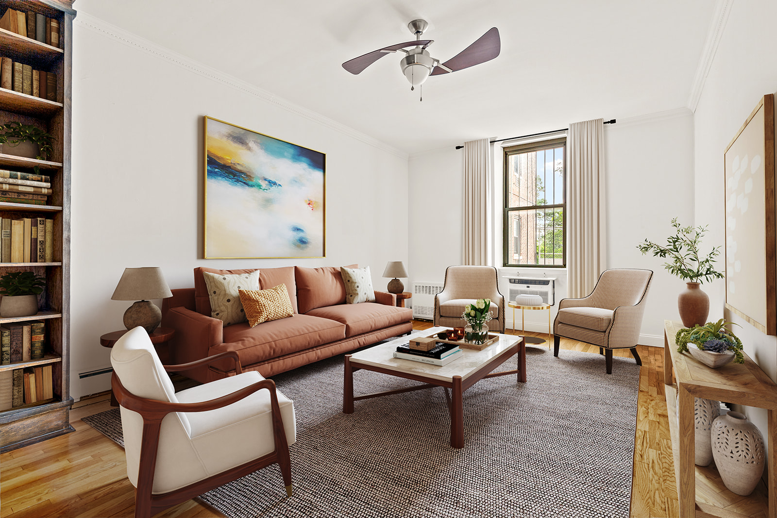 a living room with furniture a rug and a window