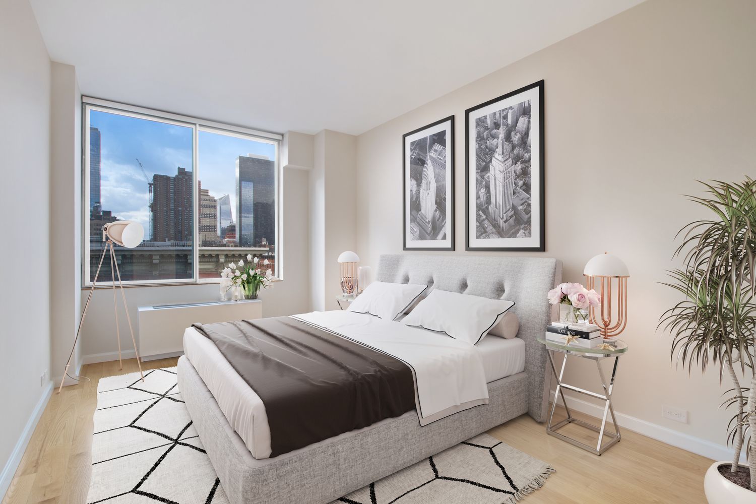 393 West 49th Street, Unit 6G Manhattan, NY 10019 - Photo 3 of 11 a bedroom with a large bed and a window