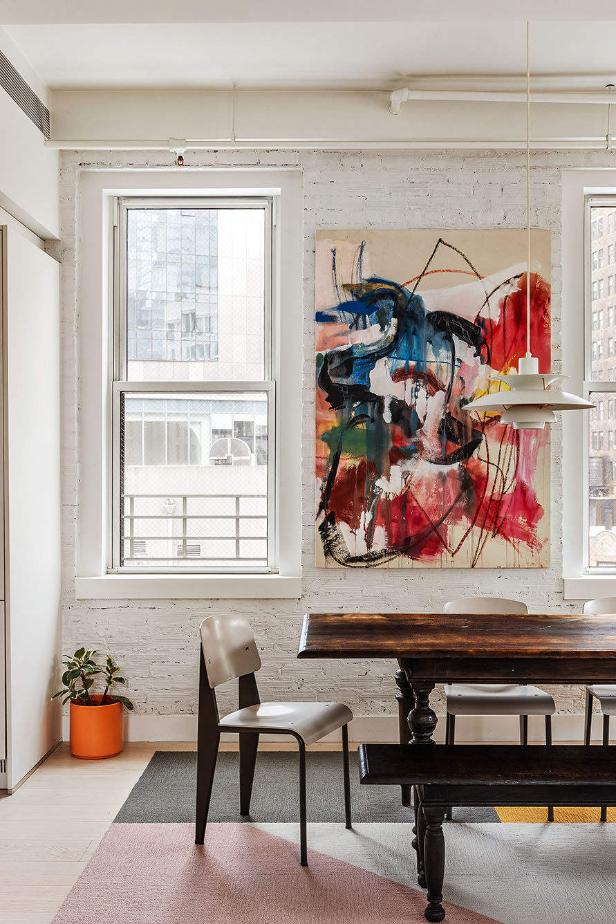 24 West 30th Street, Unit 7 Manhattan, NY 10001 - Photo 4 of 13 a living room with lots of furniture and a window