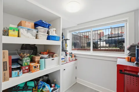 a room with storage and utility