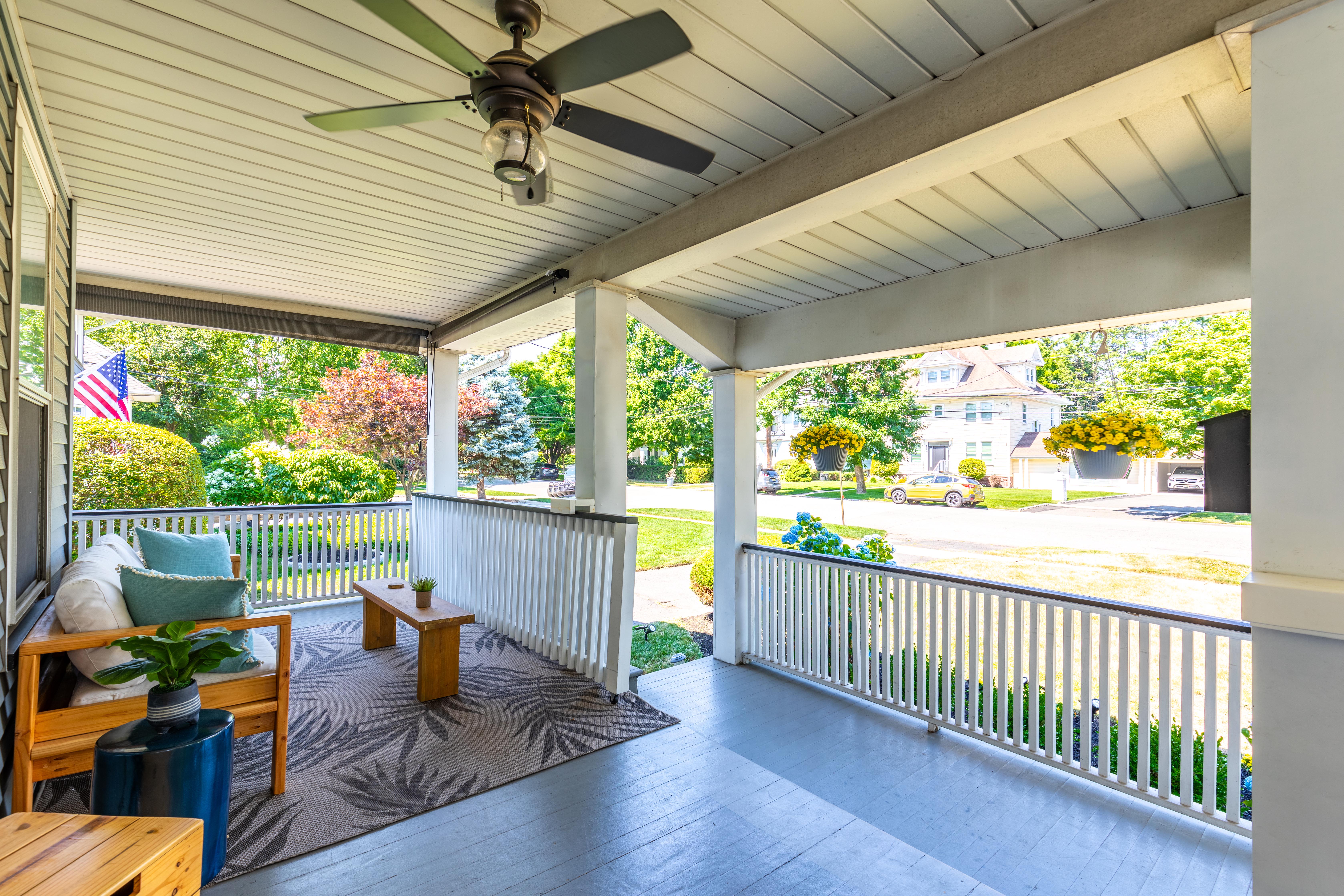 163 Ridge Road Rutherford, NJ 07070 - Photo 5 of 59 a view of a patio with a table chairs and a table in the patio