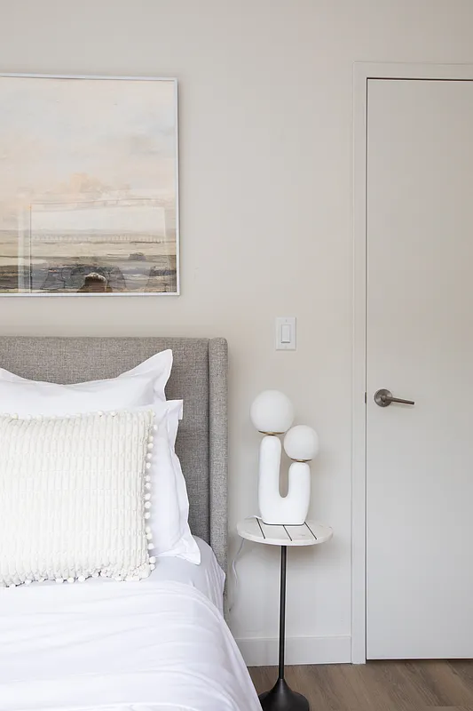 8 Palmetto Street, Unit 510 Brooklyn, NY 11221 - Photo 6 of 23 a bedroom with a bed and a night stand