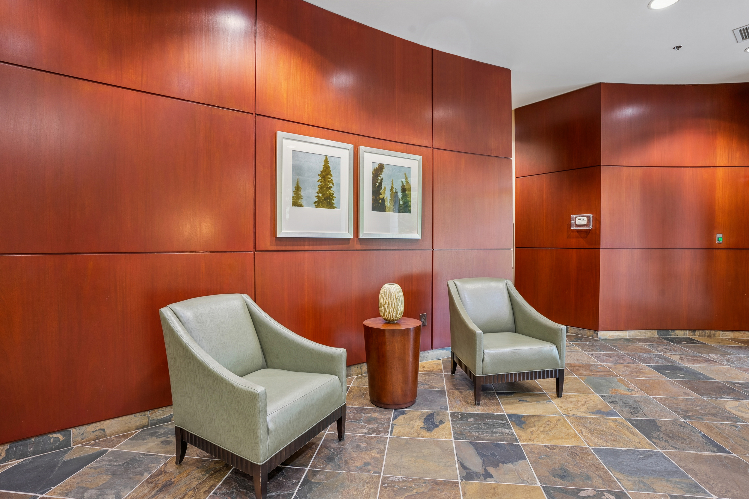 2626 Peachtree Road, Unit 1108 Atlanta, GA 30305 - Photo 20 of 25 a chair and a table in a room