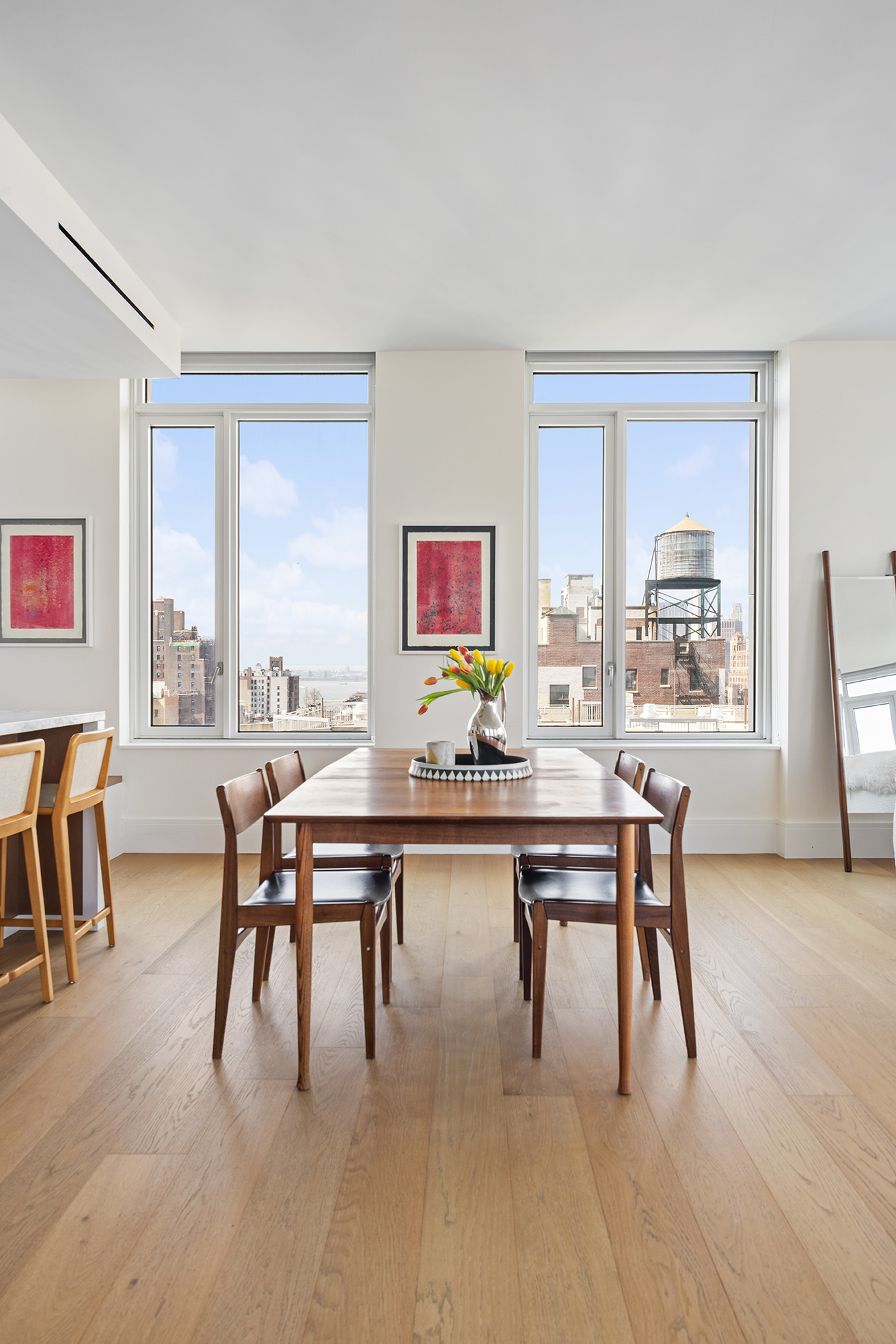1 Clinton Street, Unit 12A Brooklyn, NY 11201 - Photo 7 of 29 a view of a dining room with furniture window and outside view