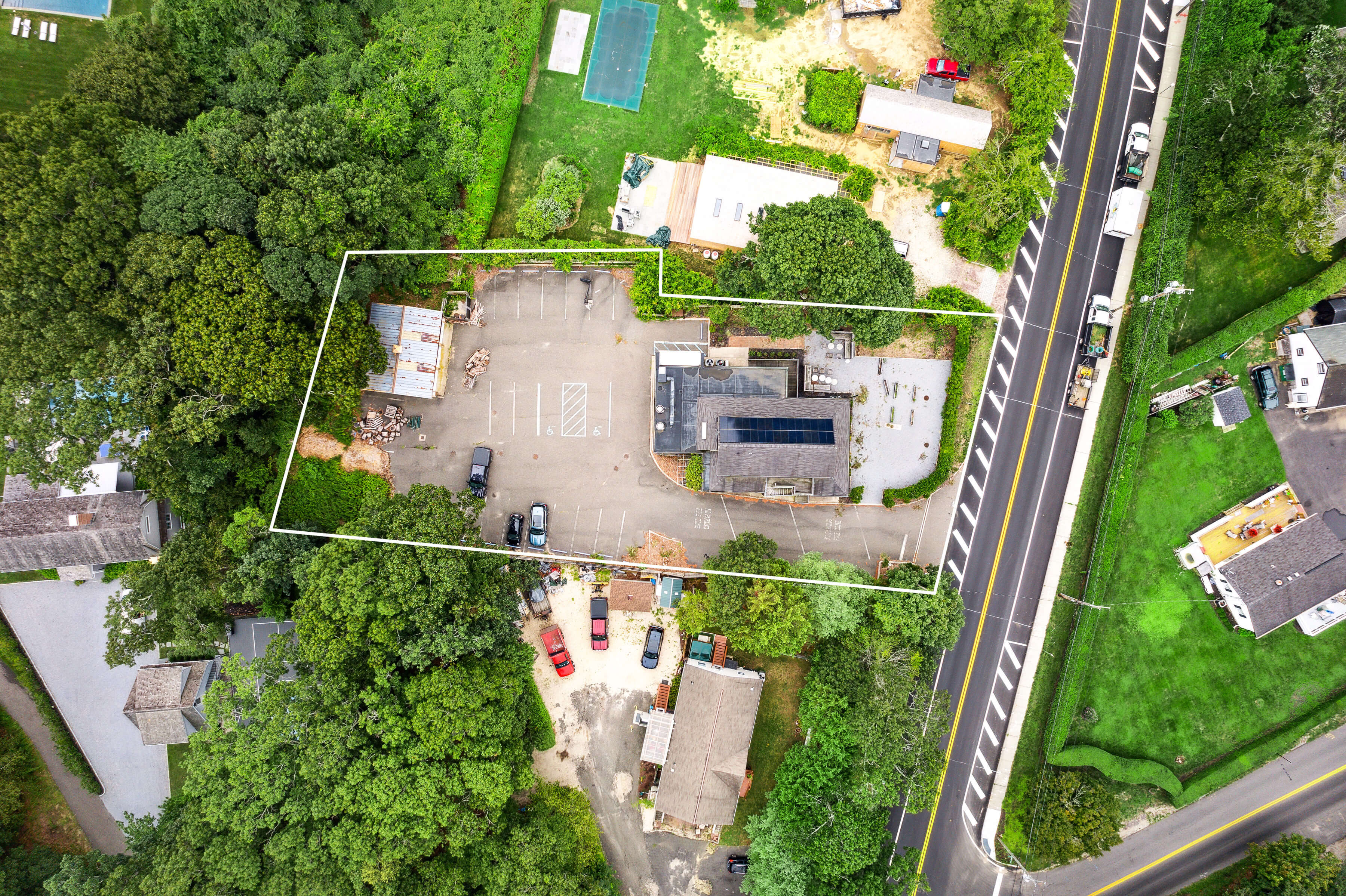 203 Bridgehampton-Sag Harbor Turnpike Bridgehampton, NY 11932 - Photo 14 of 14 an aerial view of house with yard swimming pool and outdoor seating