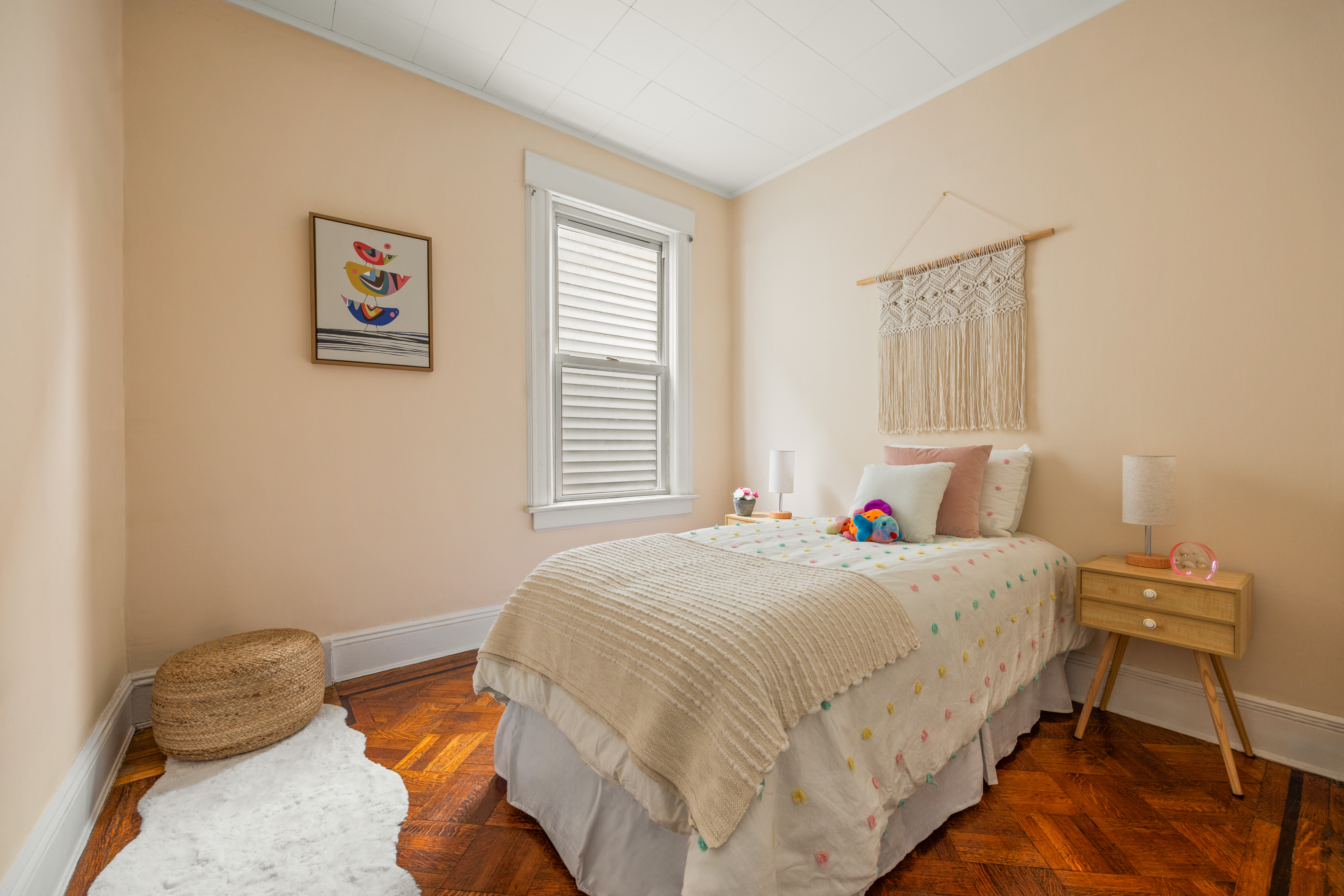 314 Sherman Street Brooklyn, NY 11218 - Photo 10 of 20 a bedroom with a bed and a window
