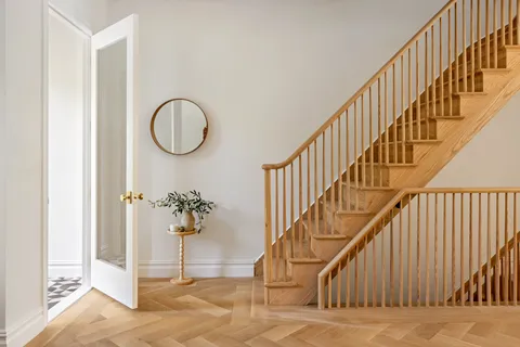 a view of entryway with wooden floor