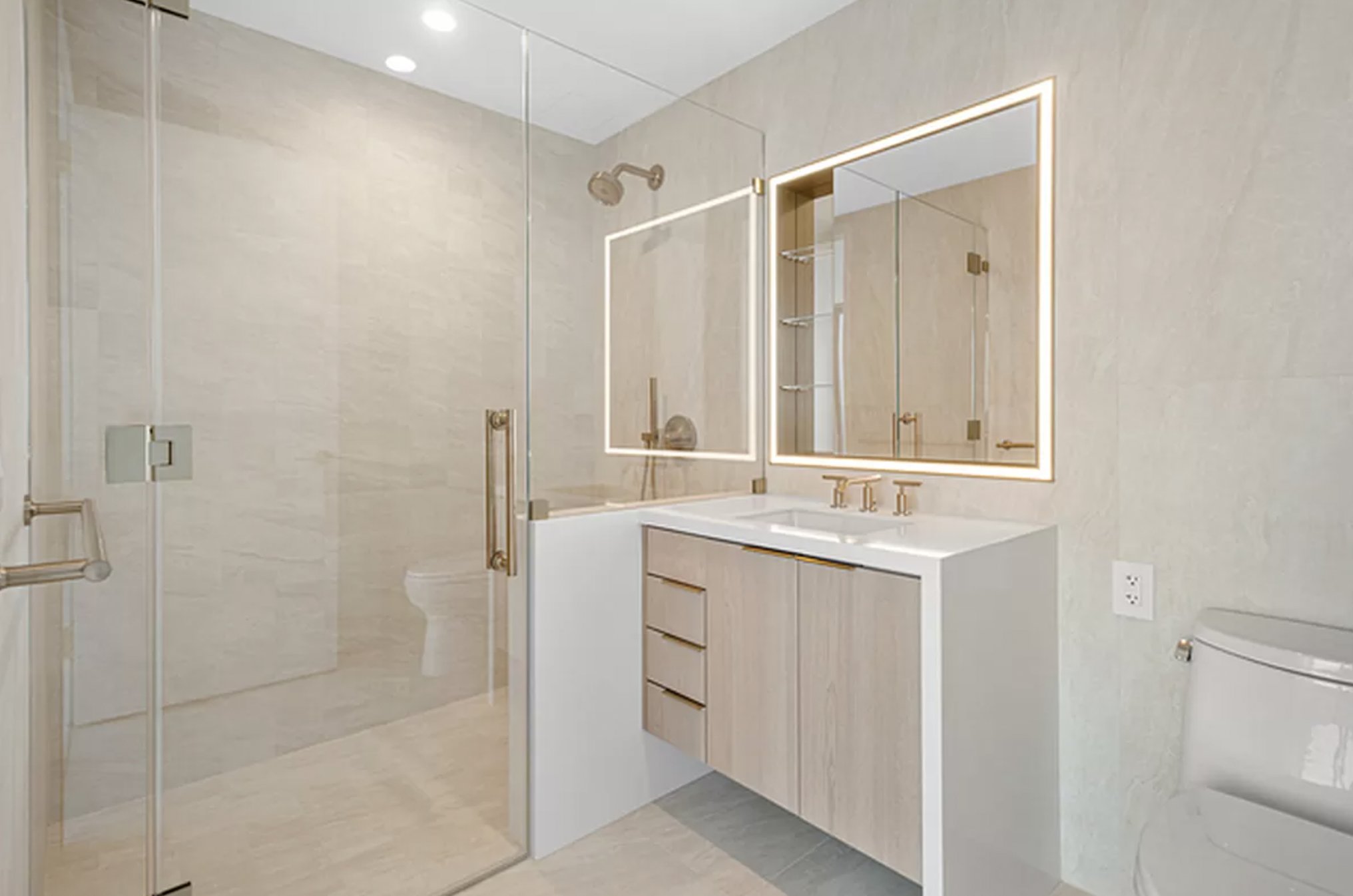 3 Court Square, Unit 1902 Queens, NY 11101 - Photo 6 of 16 a bathroom with a sink and a mirror