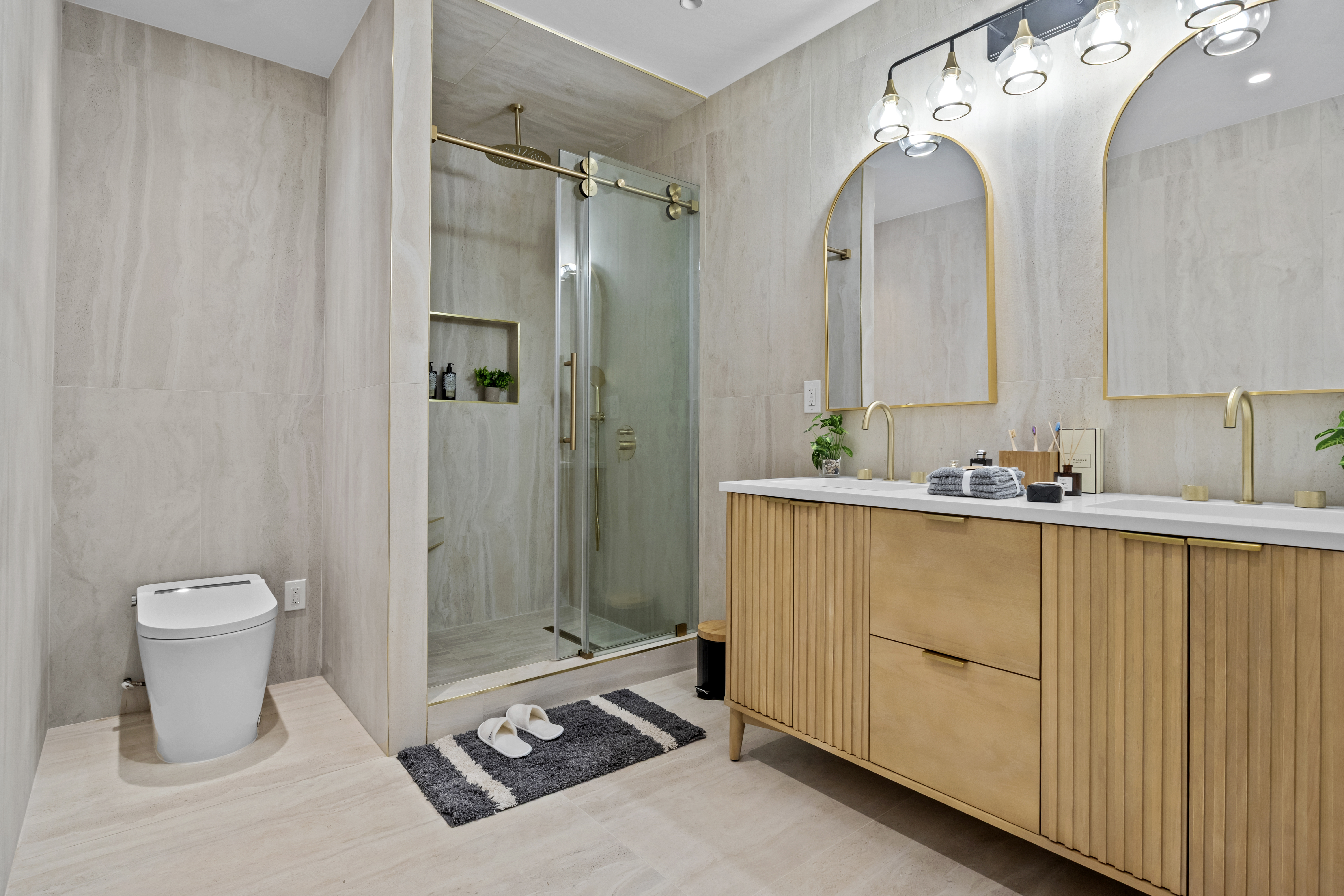 320 10th Street Brooklyn, NY 11215 - Photo 19 of 41 a bathroom with a granite countertop sink a toilet and shower