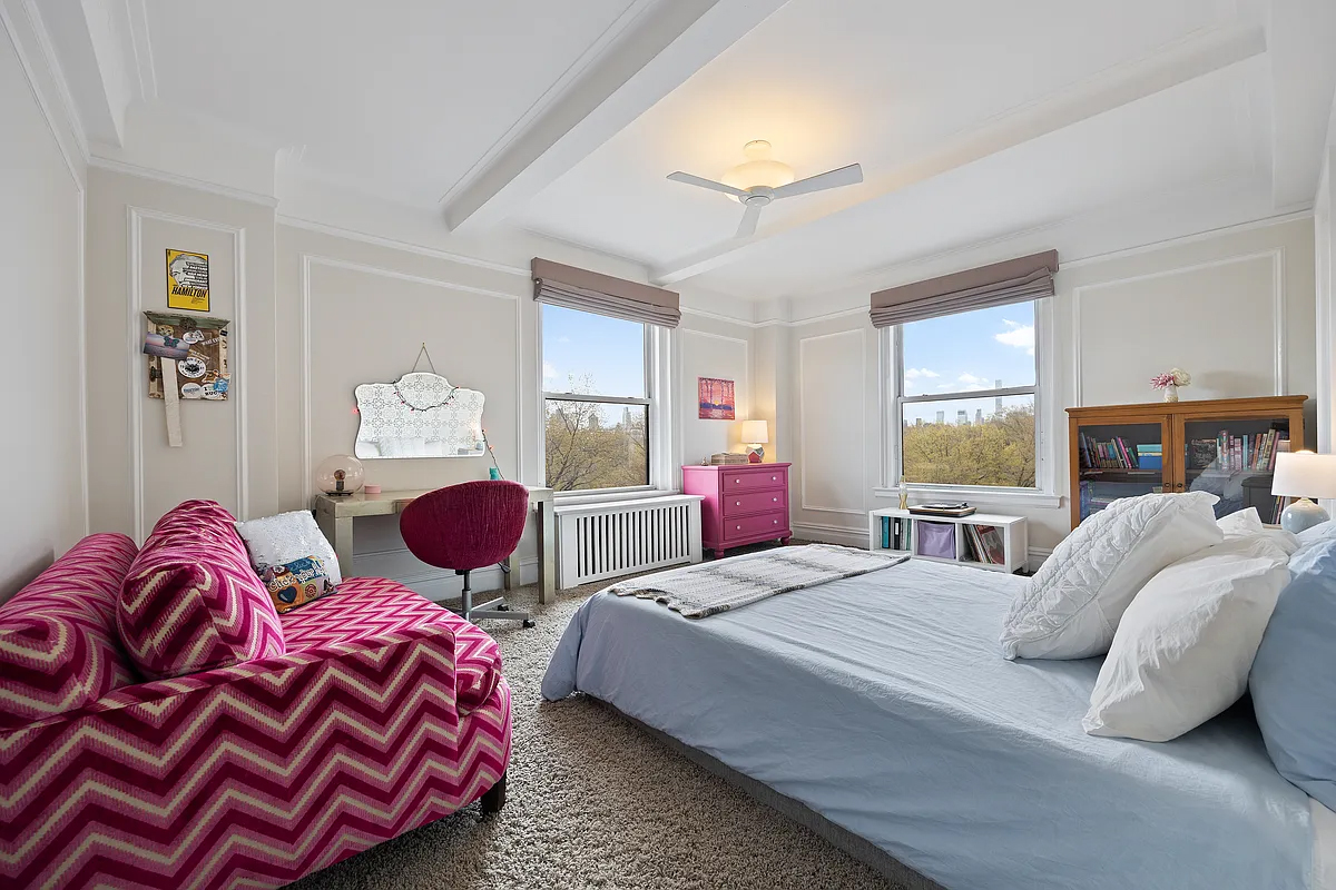 415 Central Park West, Unit 6A Manhattan, NY 10025 - Photo 19 of 25 a bedroom with two beds and a chandelier