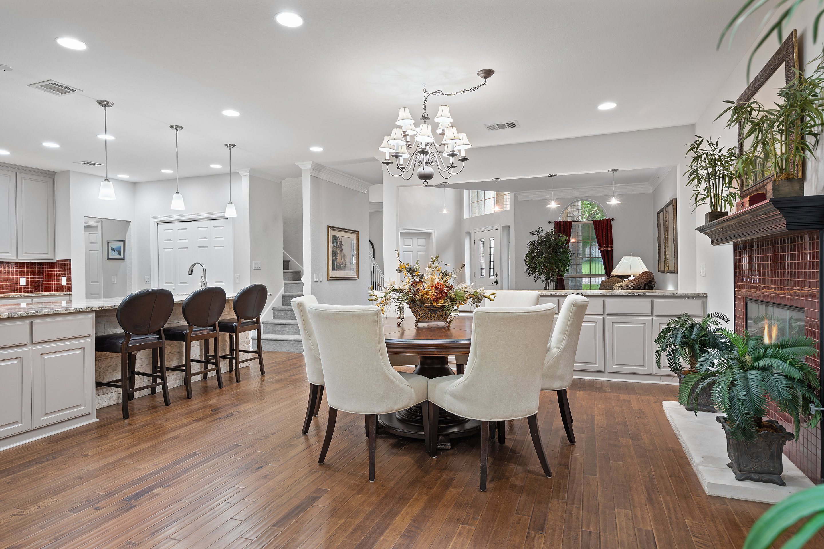 2603 Pearce Road Austin, TX 78730 - Photo 10 of 41 a view of a dining room with furniture and wooden floor