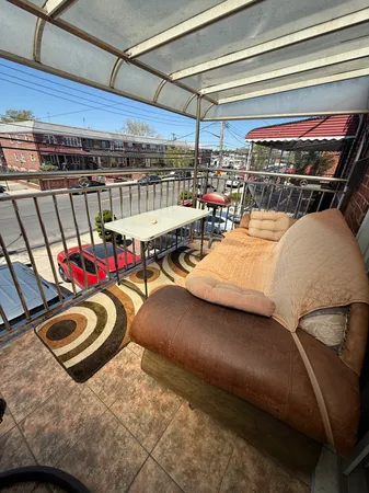 a bedroom with furniture and a chandelier