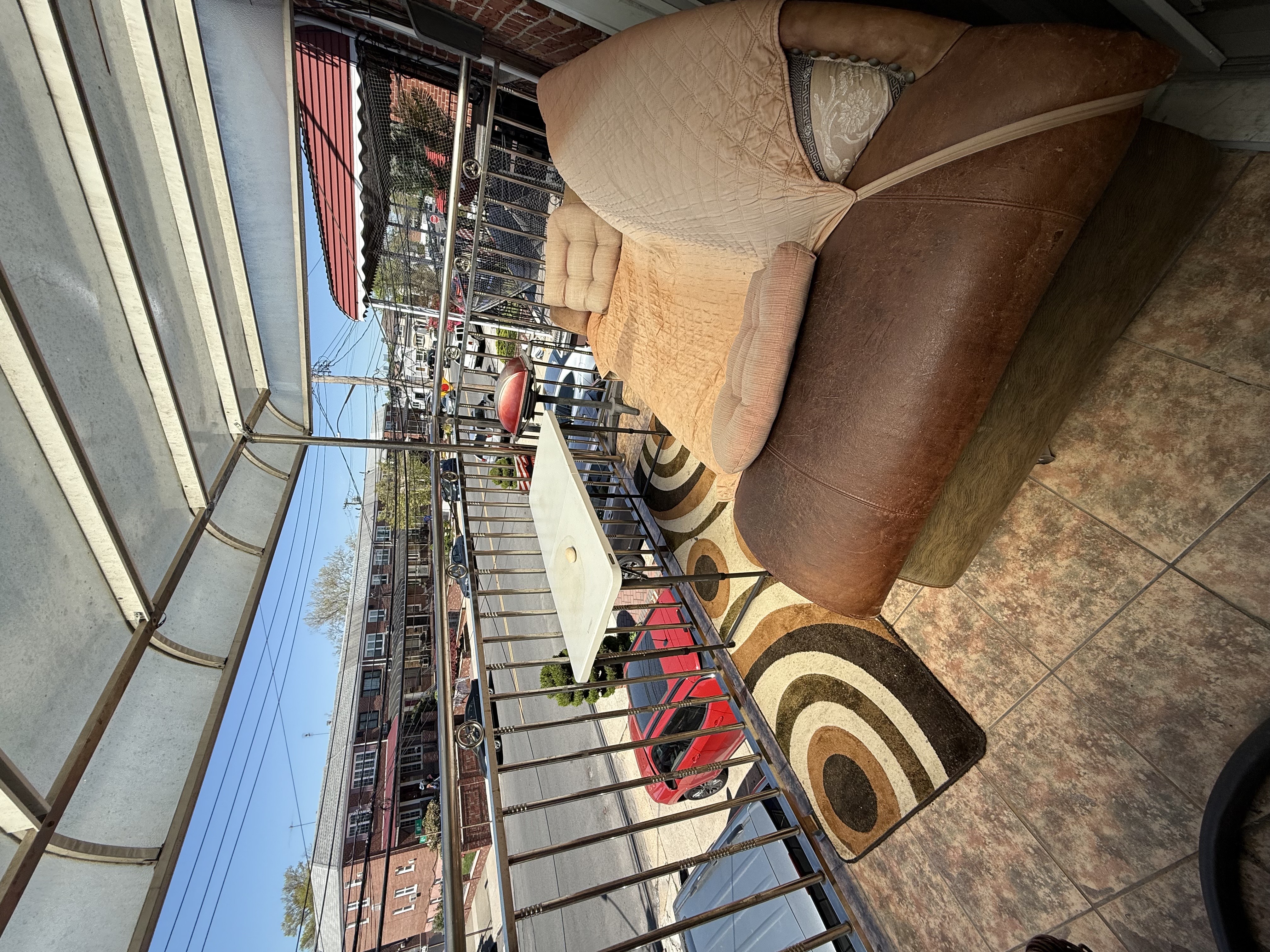 62-23 69th Place Queens, NY 11379 - Photo 4 of 4 a bedroom with furniture and a chandelier