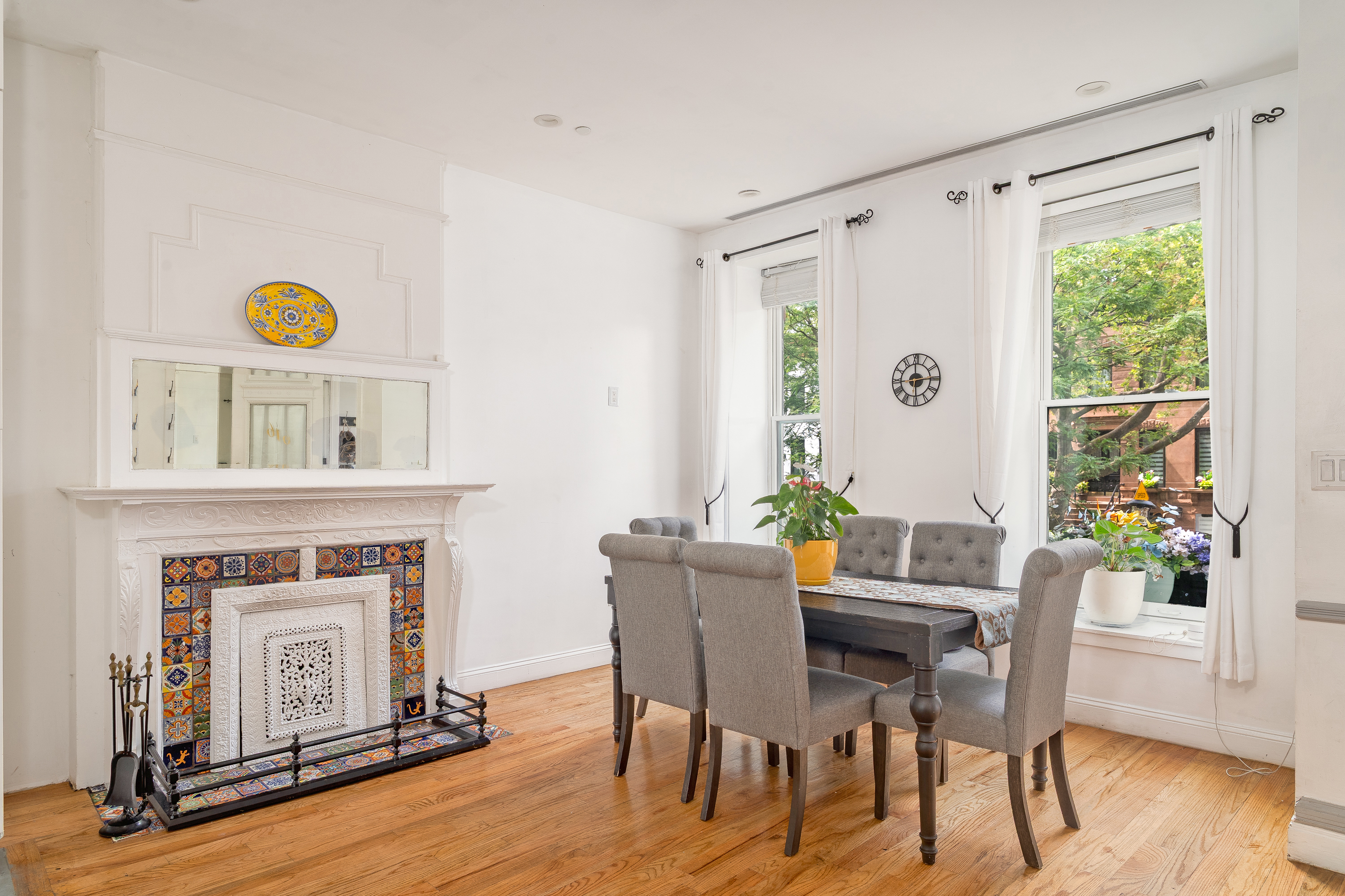 616 MacDonough Street, Unit 2 Brooklyn, NY 11233 - Photo 4 of 12 a view of a dining room with furniture window and wooden floor