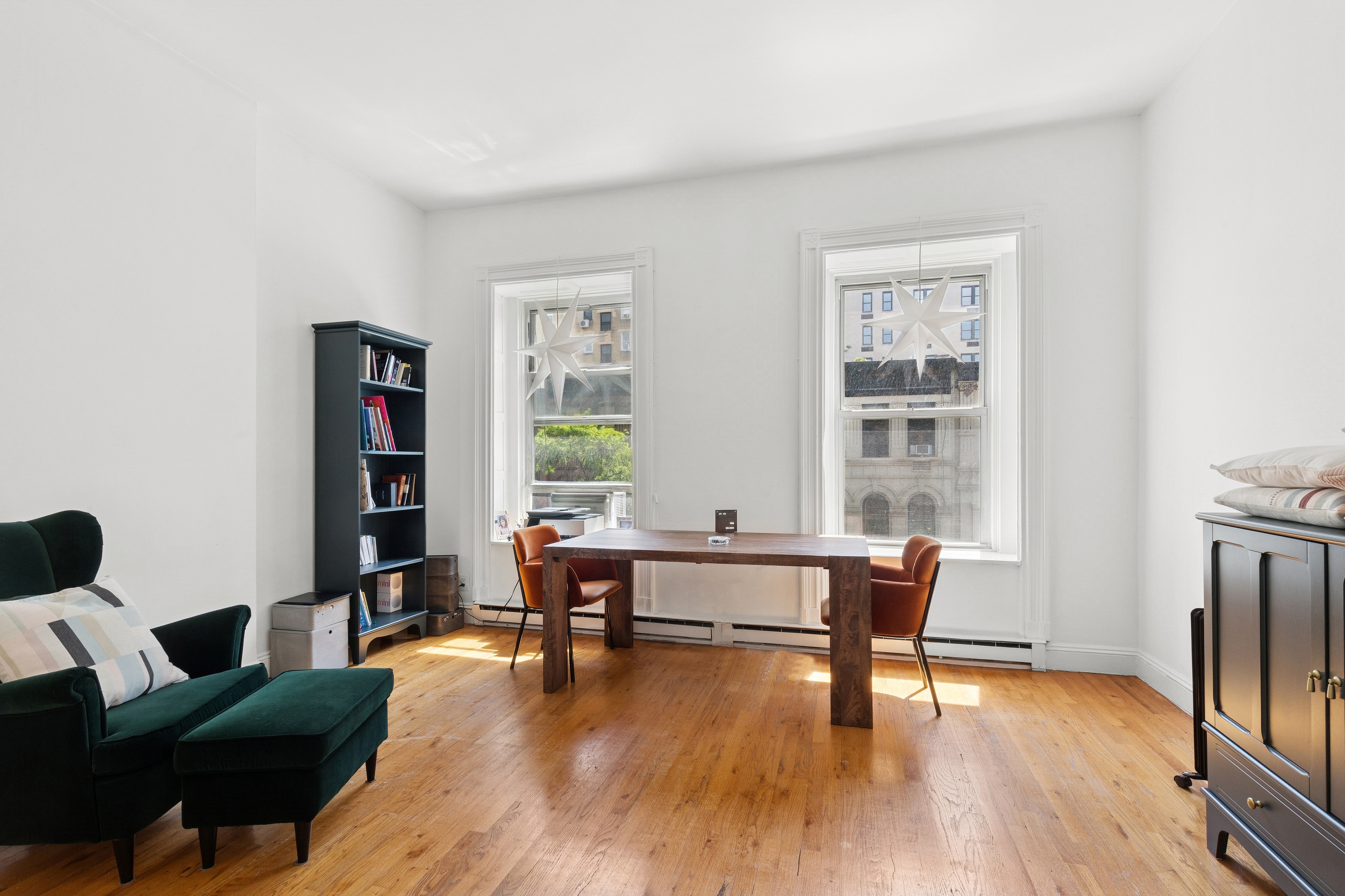 53 West 82nd Street, Unit 2 Manhattan, NY 10024 - Photo 5 of 10 a view of a livingroom with workspace and a window