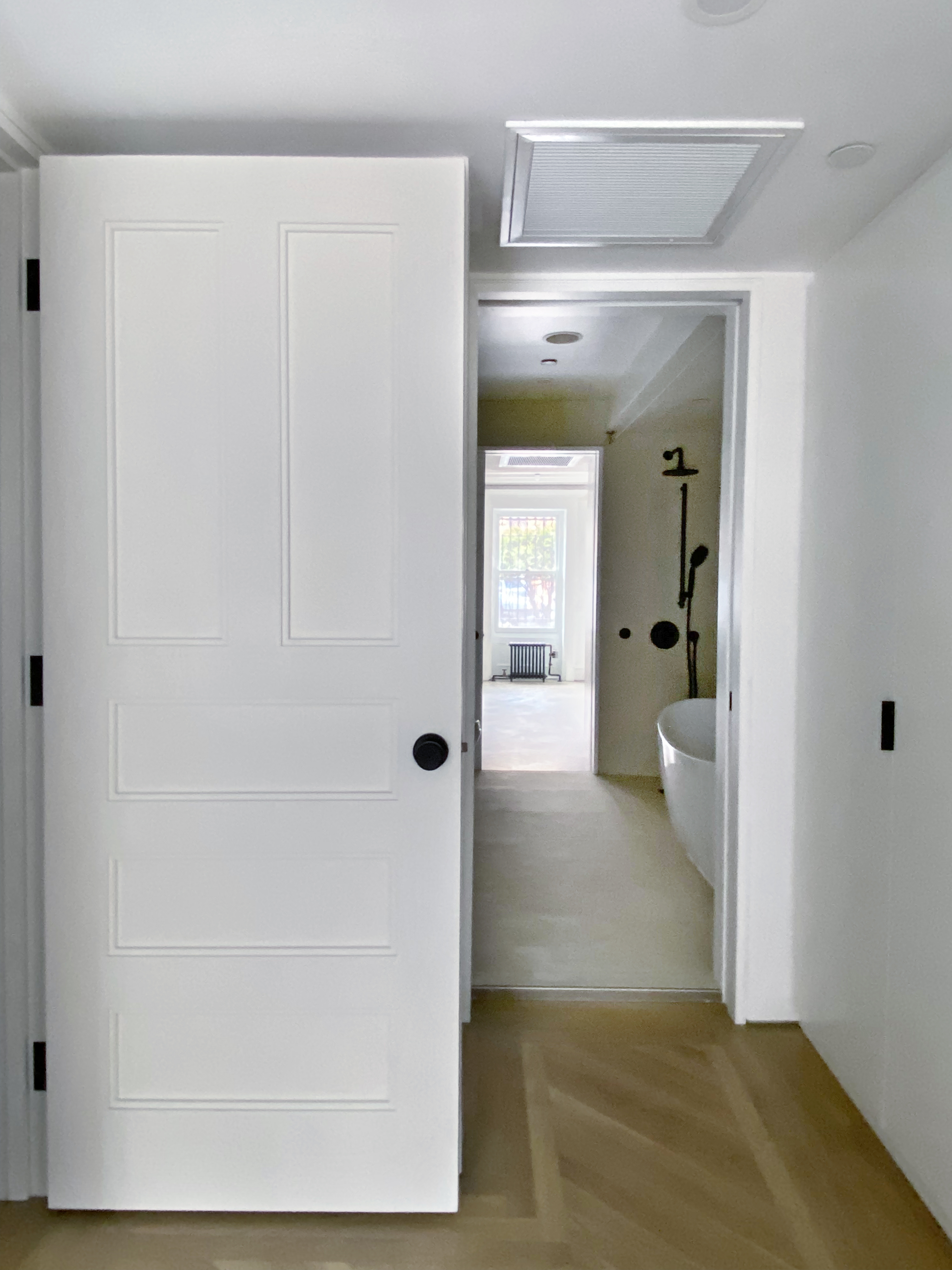1420 Pacific Street, Unit 1 Brooklyn, NY 11216 - Photo 19 of 30 a view of a bathroom with a glass door