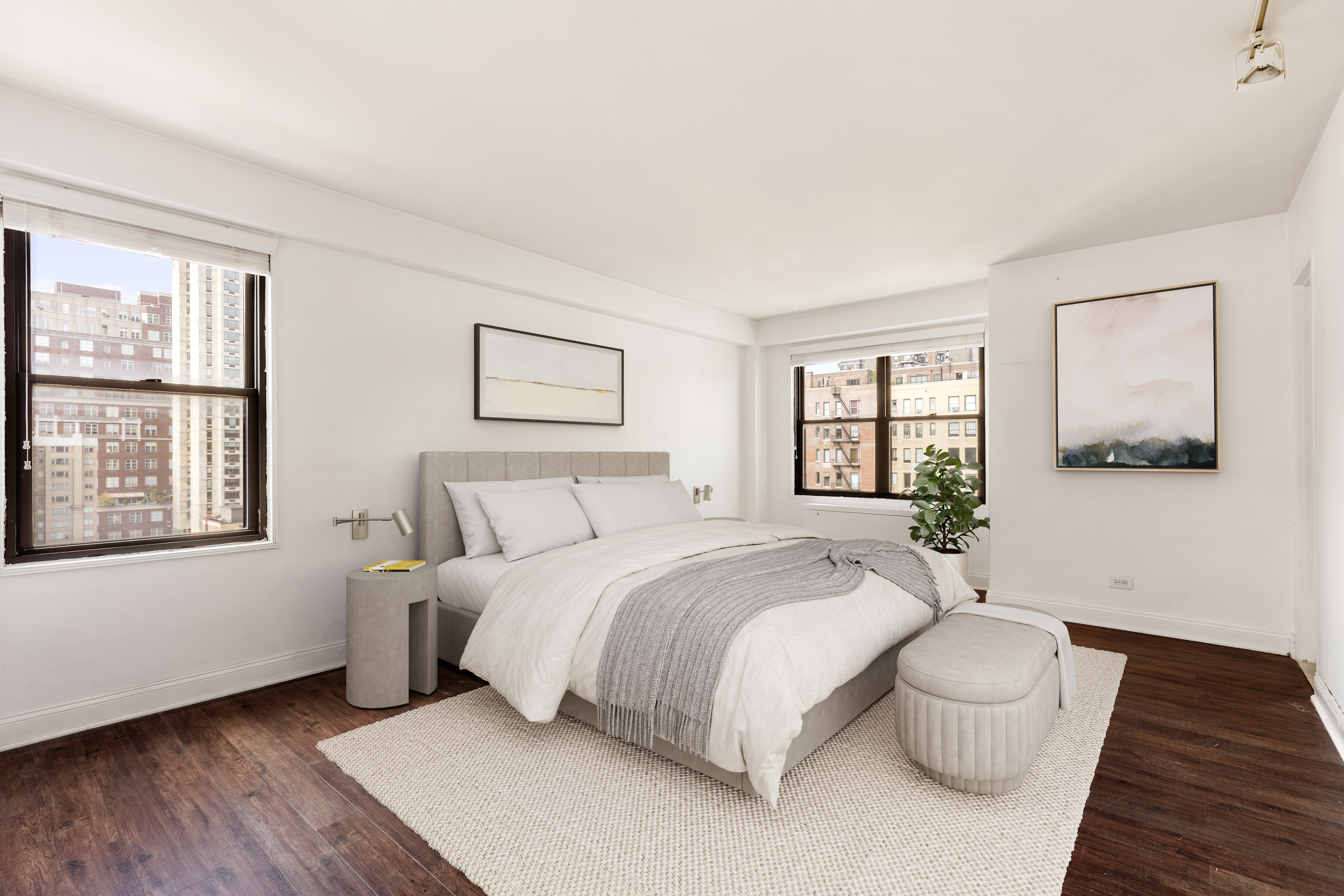 120 East 90th Street, Unit 16E Manhattan, NY 10128 - Photo 10 of 15 a spacious bedroom with a bed and a large window