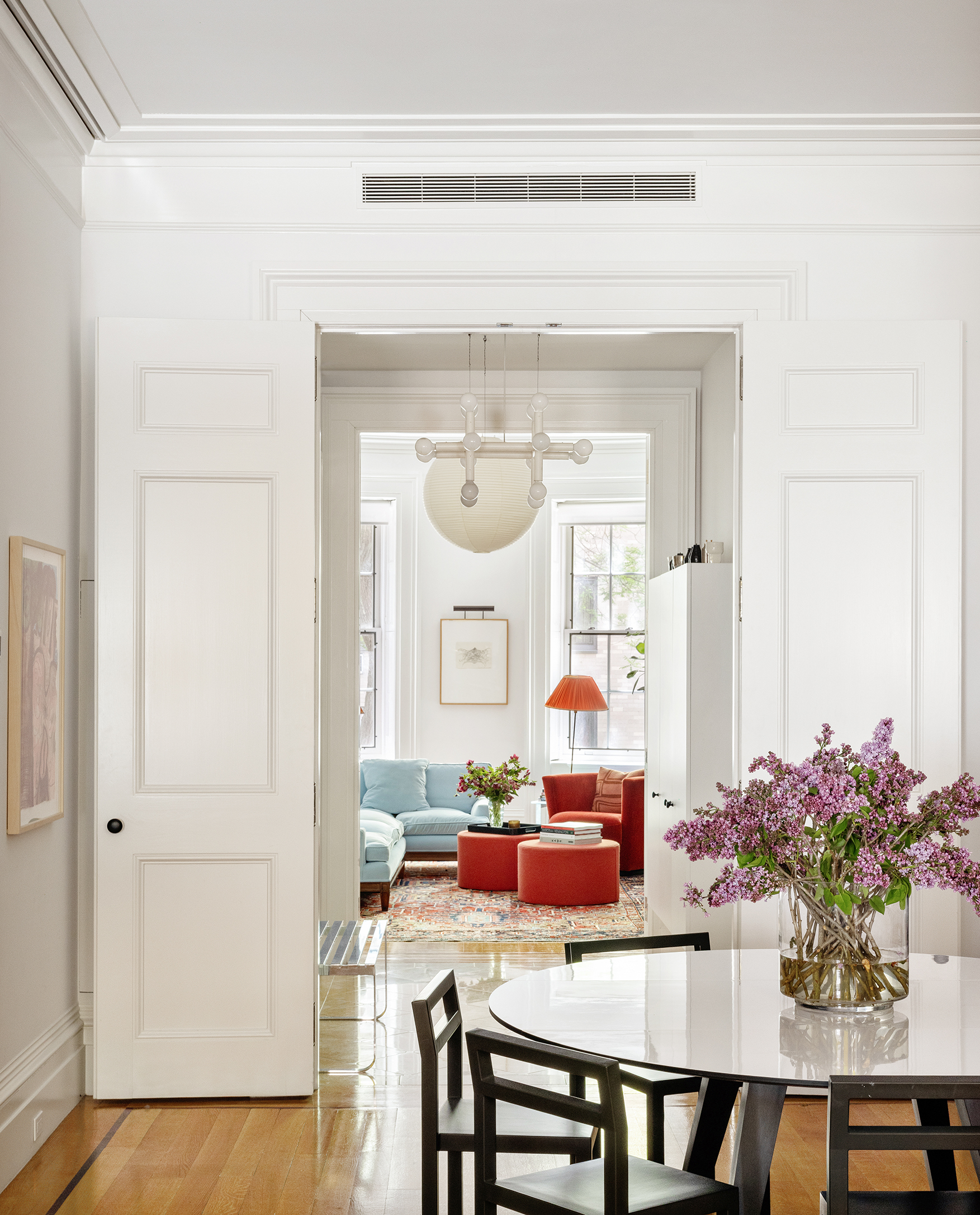 9 West 16th Street, Unit 3 Manhattan, NY 10011 - Photo 8 of 16 a view of a dining room with furniture and wooden floor
