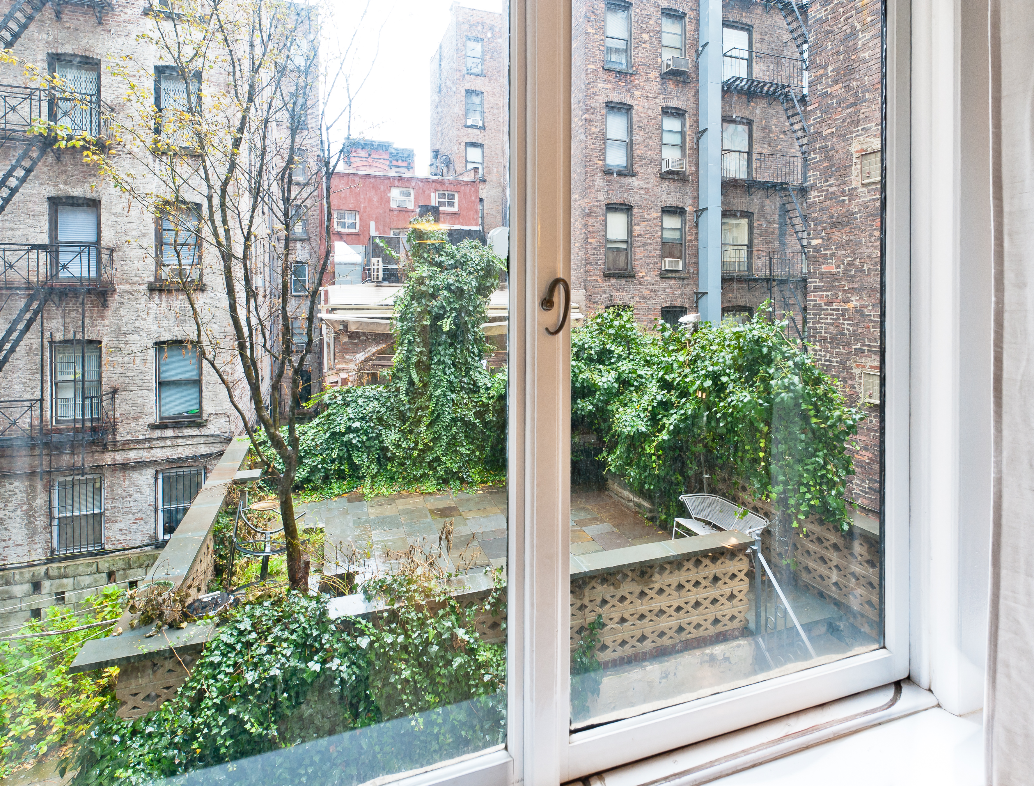 10 Charles Street, Unit 2B Manhattan, NY 10014 - Photo 3 of 8 a view of a glass door