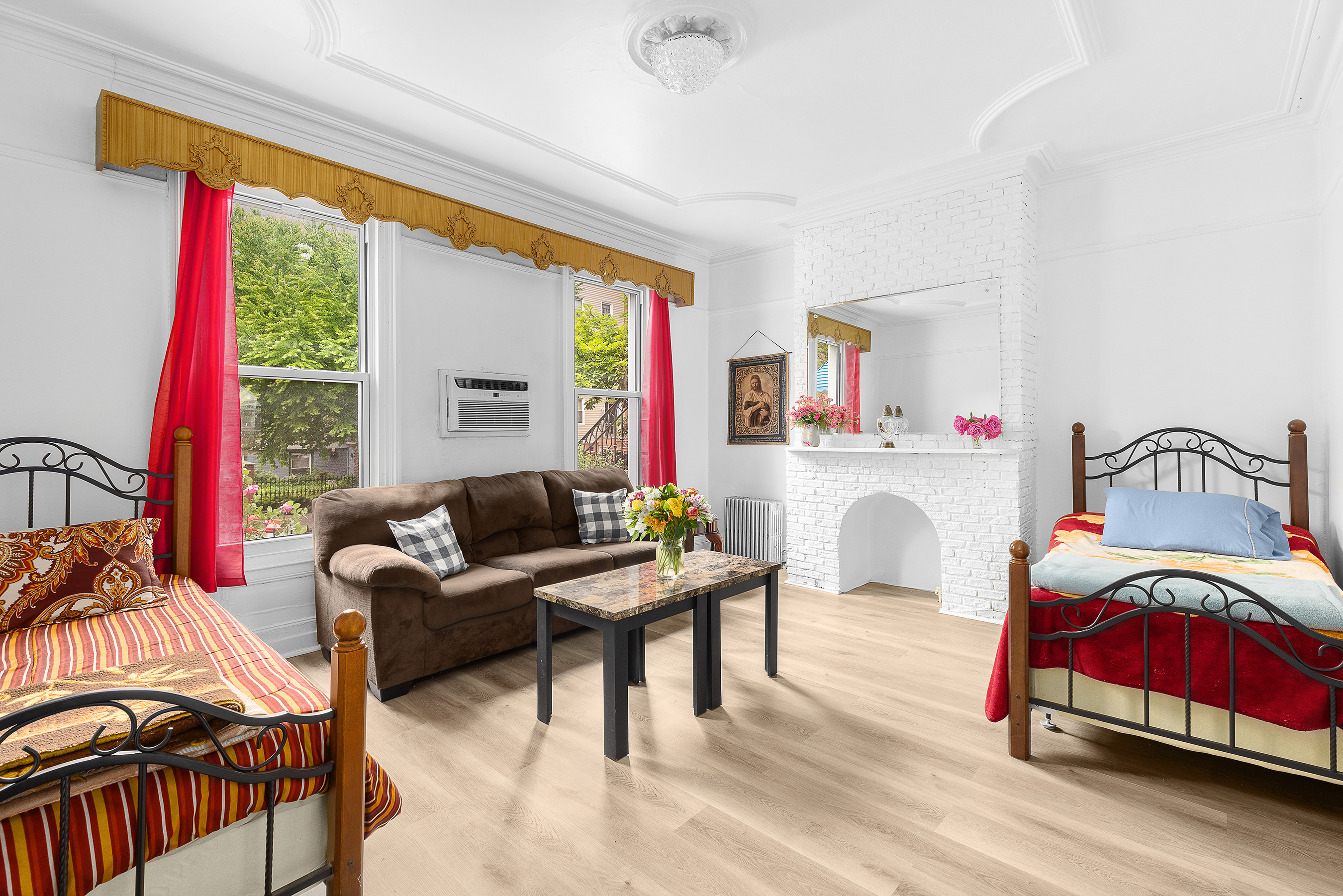 39 Broome Street Brooklyn, NY 11222 - Photo 3 of 16 a living room with furniture and a large window