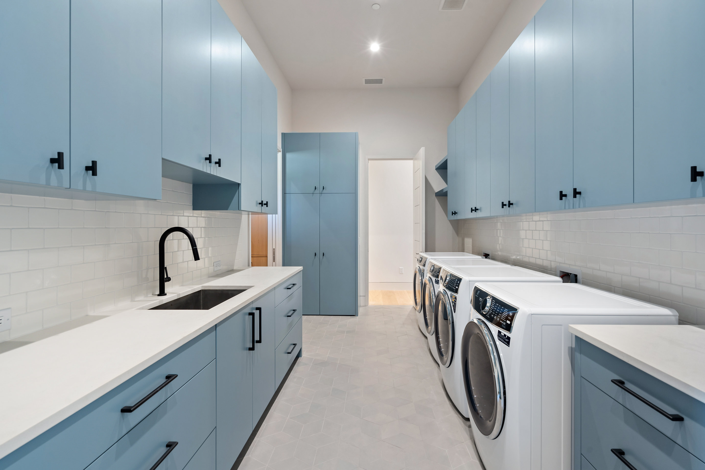 1905 Hallam Drive Austin, TX 78746 - Photo 16 of 39 a view of kitchen with a sink and dishwasher