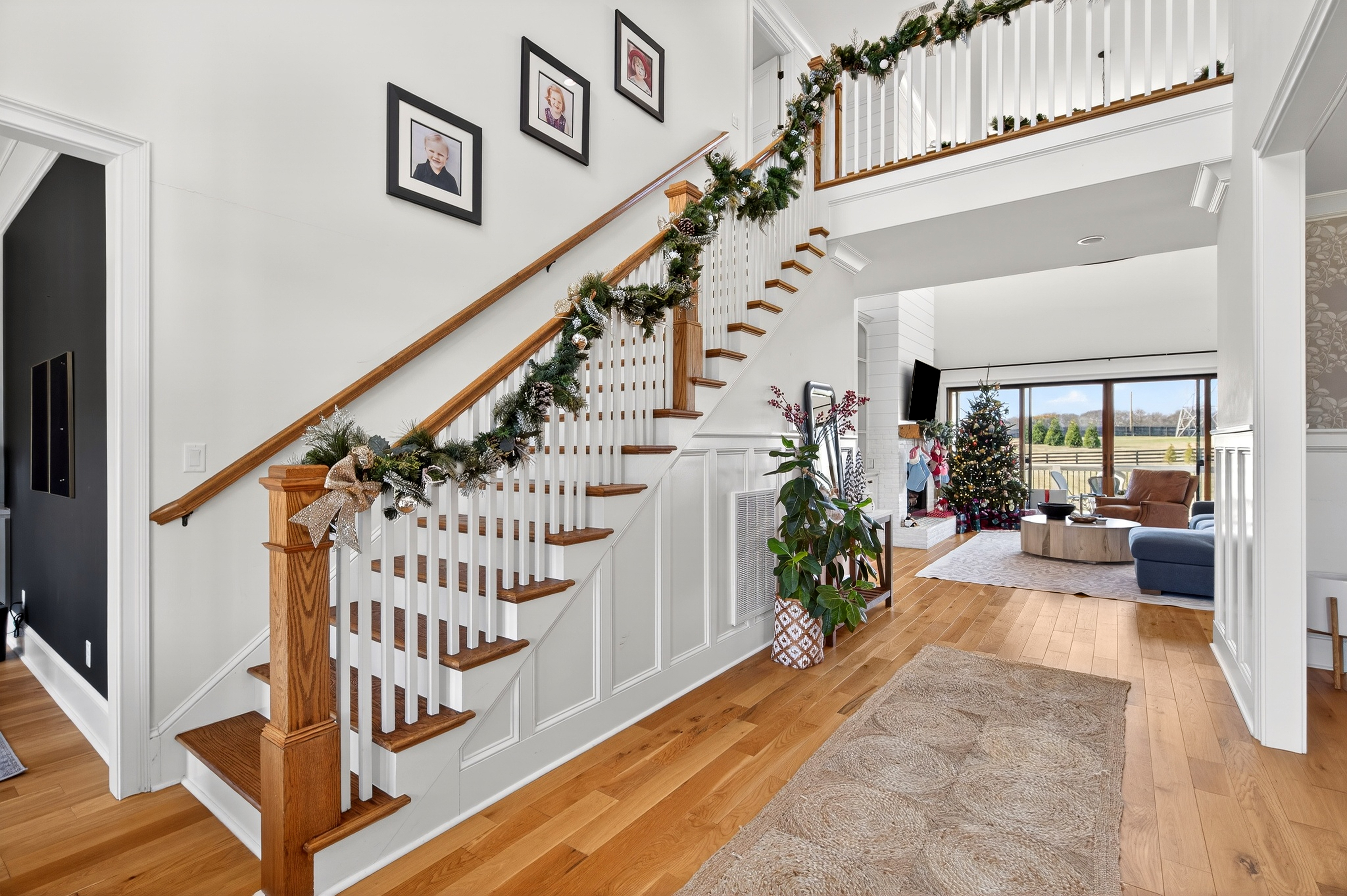 1703 Swansons Rdg Drive Franklin, TN 37064 - Photo 9 of 67 a view of entryway livingroom and hall with wooden floor