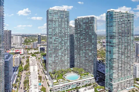 a view of a city with tall buildings