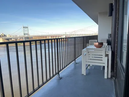 a view of a balcony with an outdoor space