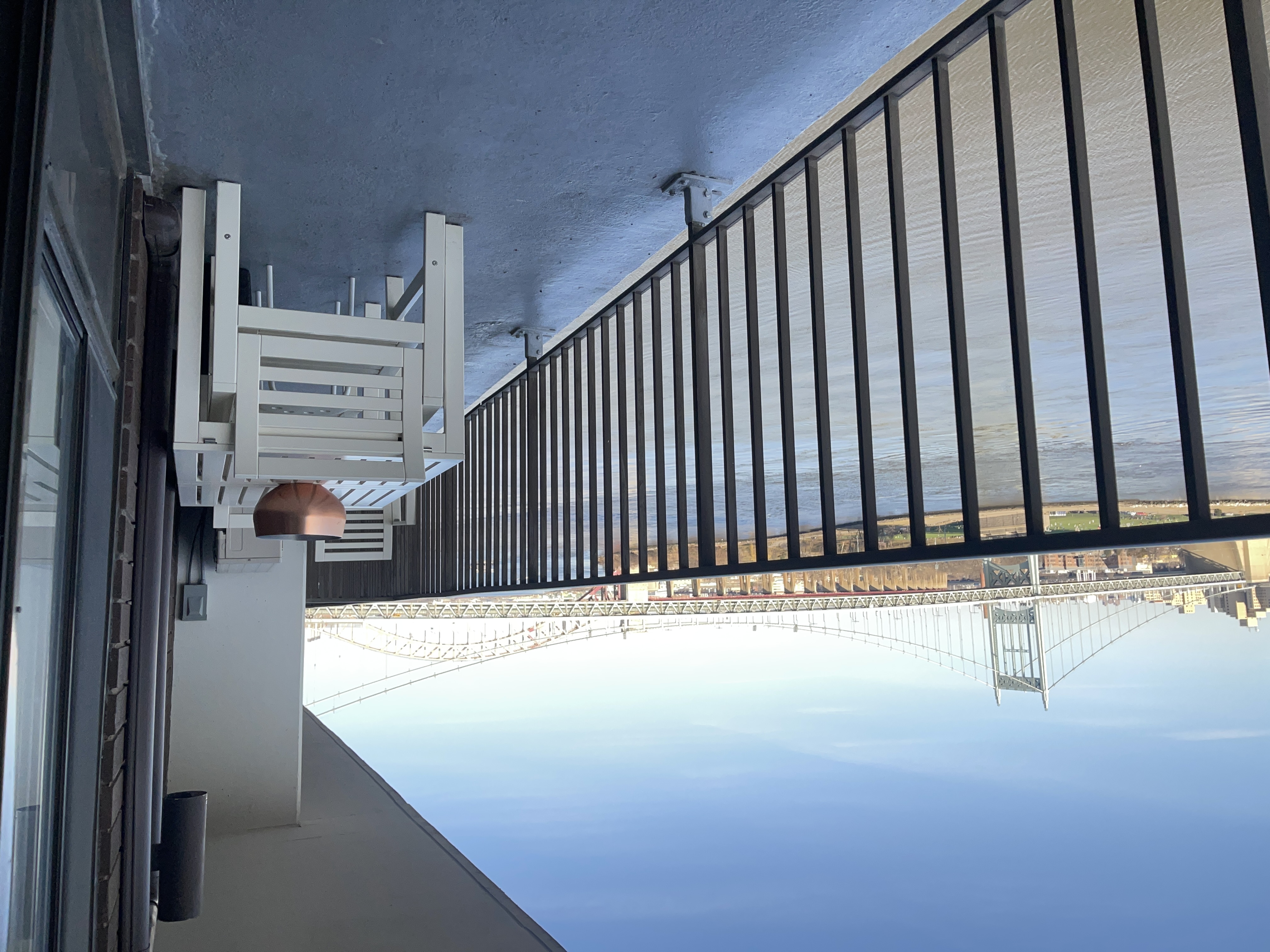 25-40 Shore Boulevard, Unit 15T Queens, NY 11102 - Photo 4 of 24 a view of a balcony with an outdoor space