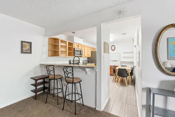 a view of a workspace with furniture