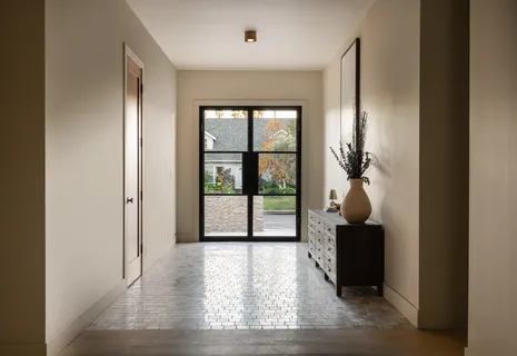 a kitchen with stainless steel appliances a sink stove and cabinets