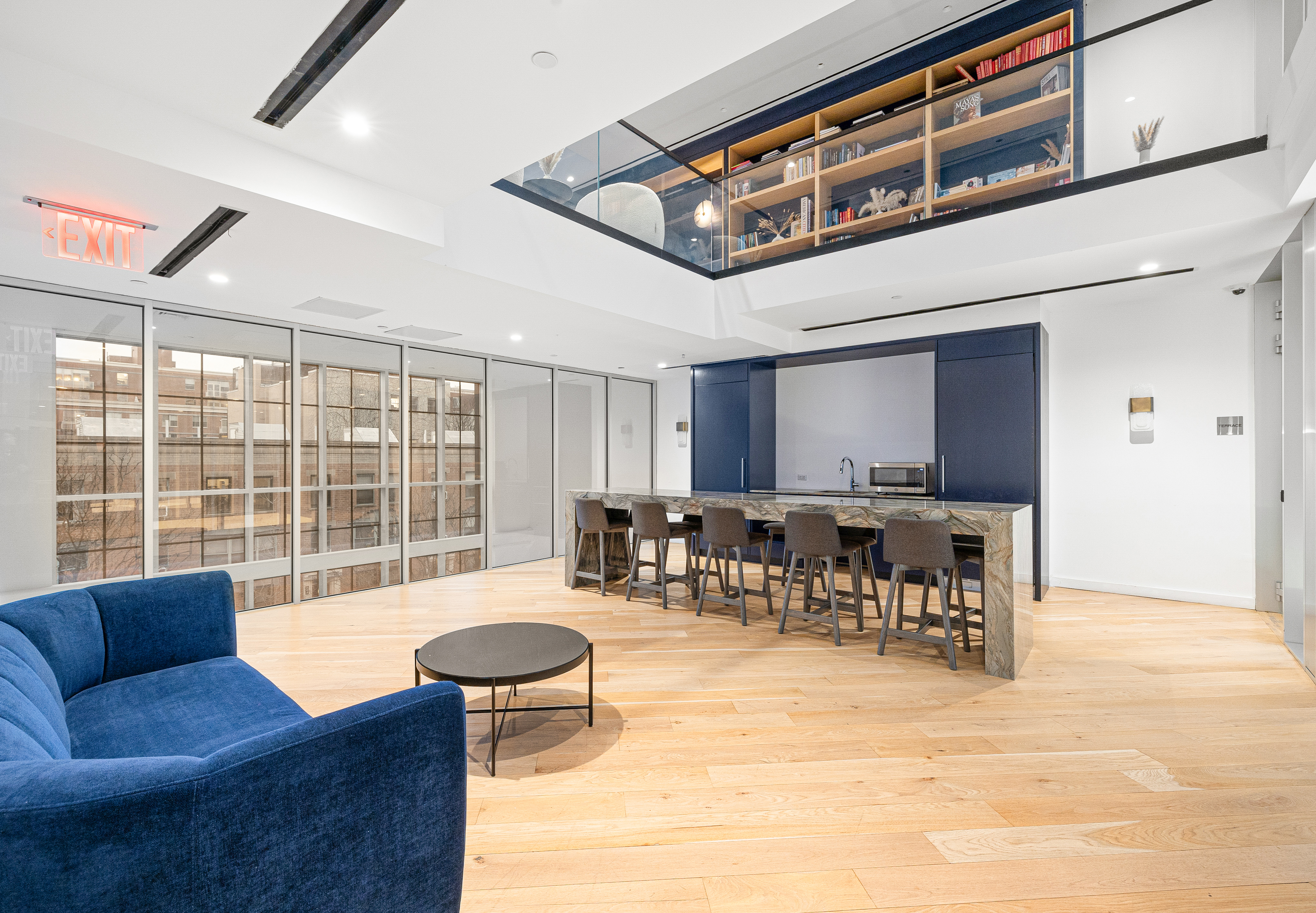 300 West 122nd Street, Unit 4F Manhattan, NY 10027 - Photo 22 of 32 a living room with furniture a table and a large window