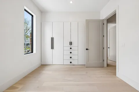 a white bath tub sitting in a bathroom