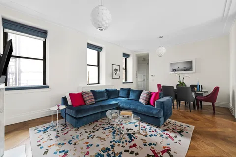 a living room with furniture and a couch
