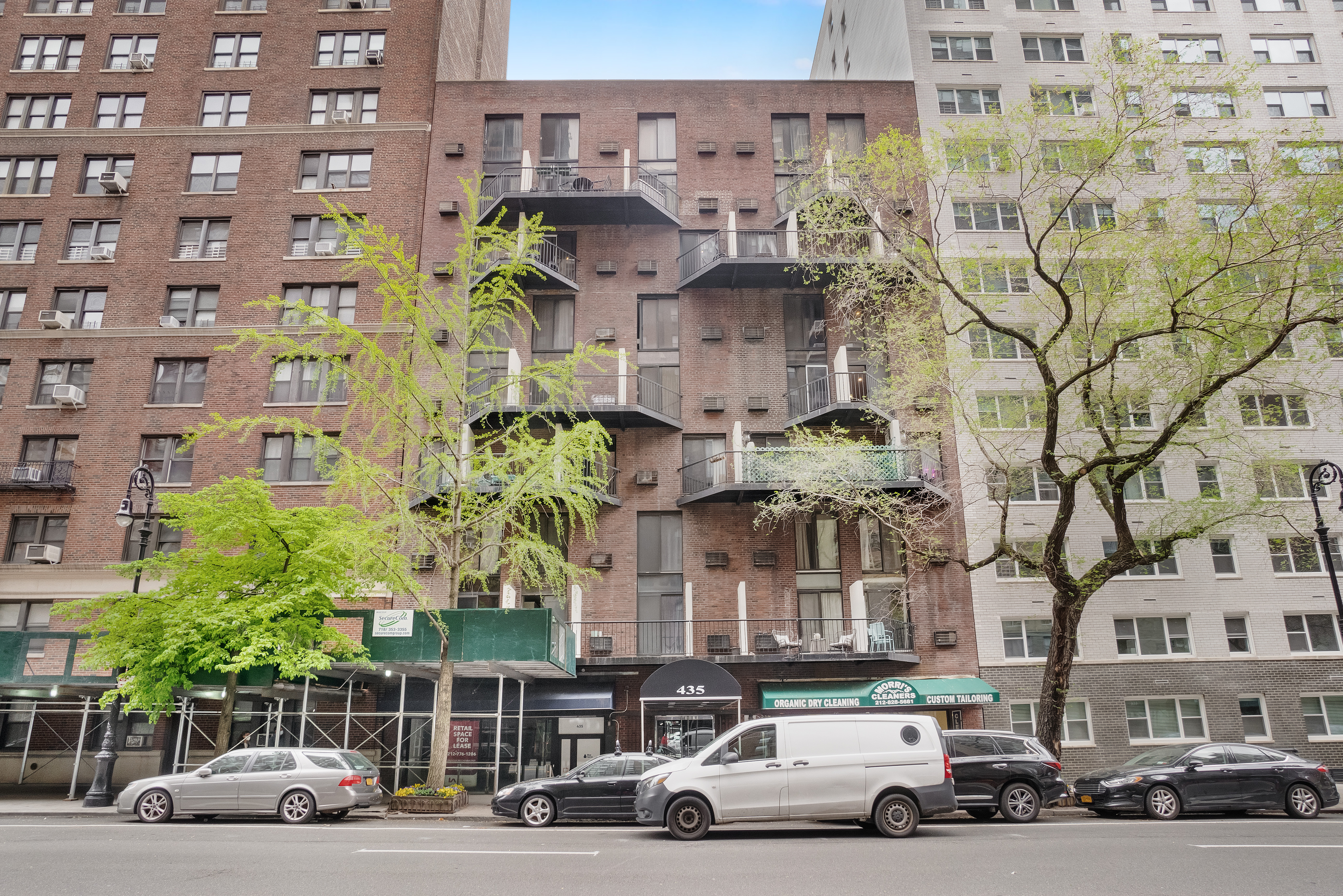 435 East 86th Street, Unit 2C Manhattan, NY 10028 - Photo 9 of 10 a cars parked in front of a building