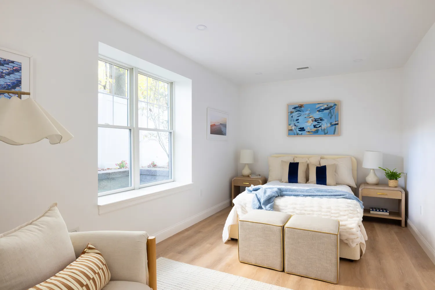 a living room with a couch next to a window