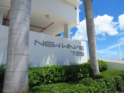 a sign that is on the side of a building