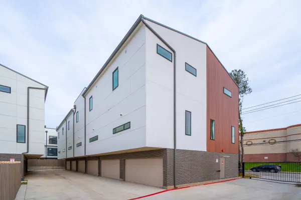 a view of a house with a street